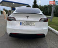 Білий Тесла Model Y, об'ємом двигуна 0 л та пробігом 79 тис. км за 27899 $, фото 4 на Automoto.ua