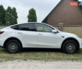 Білий Тесла Model Y, об'ємом двигуна 0 л та пробігом 54 тис. км за 23900 $, фото 4 на Automoto.ua