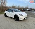 Белый Тесла Model Y, объемом двигателя 0 л и пробегом 61 тыс. км за 29900 $, фото 1 на Automoto.ua