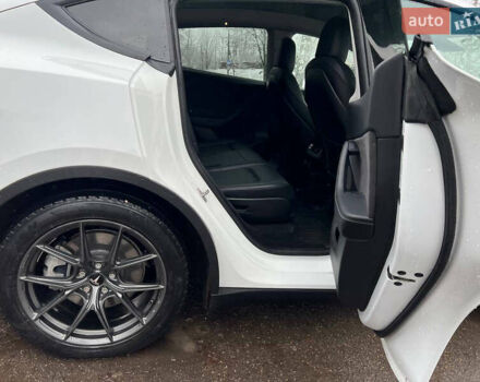 Білий Тесла Model Y, об'ємом двигуна 0 л та пробігом 88 тис. км за 24900 $, фото 25 на Automoto.ua