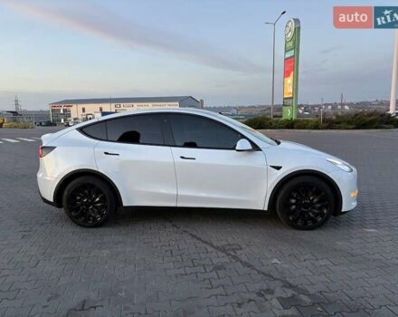 Белый Тесла Model Y, объемом двигателя 0 л и пробегом 84 тыс. км за 23700 $, фото 1 на Automoto.ua