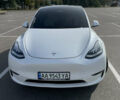 Белый Тесла Model Y, объемом двигателя 0 л и пробегом 56 тыс. км за 45300 $, фото 1 на Automoto.ua