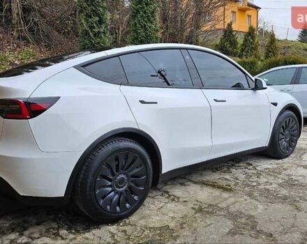Белый Тесла Model Y, объемом двигателя 0 л и пробегом 99 тыс. км за 20000 $, фото 2 на Automoto.ua