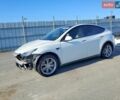 Белый Тесла Model Y, объемом двигателя 0 л и пробегом 50 тыс. км за 6500 $, фото 1 на Automoto.ua