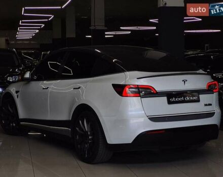 Белый Тесла Model Y, объемом двигателя 0 л и пробегом 58 тыс. км за 26999 $, фото 2 на Automoto.ua