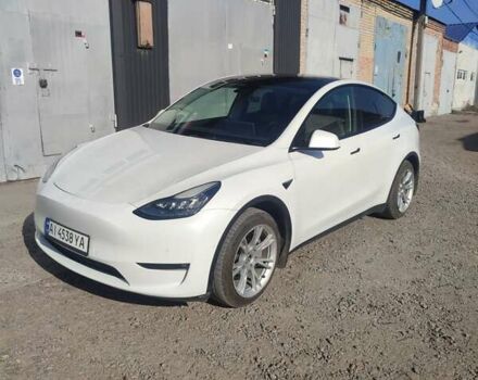 Белый Тесла Model Y, объемом двигателя 0 л и пробегом 76 тыс. км за 23000 $, фото 1 на Automoto.ua