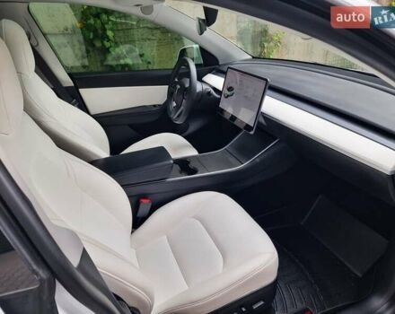 Белый Тесла Model Y, объемом двигателя 0 л и пробегом 98 тыс. км за 23699 $, фото 45 на Automoto.ua