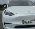 Білий Тесла Model Y, об'ємом двигуна 0 л та пробігом 79 тис. км за 27899 $, фото 1 на Automoto.ua