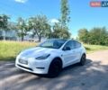 Білий Тесла Model Y, об'ємом двигуна 0 л та пробігом 87 тис. км за 23900 $, фото 1 на Automoto.ua
