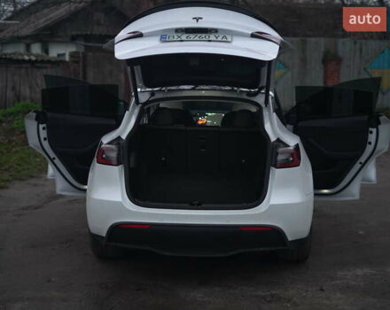 Білий Тесла Model Y, об'ємом двигуна 0 л та пробігом 66 тис. км за 23500 $, фото 54 на Automoto.ua