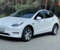 Белый Тесла Model Y, объемом двигателя 0 л и пробегом 65 тыс. км за 29999 $, фото 1 на Automoto.ua