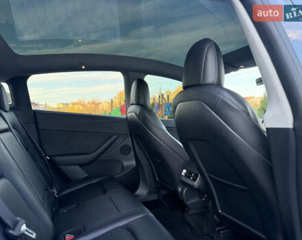 Тесла Model Y 2021 в Хмельницком на Automoto.ua Белый Тесла Model Y, объемом двигателя 0 л и пробегом 83 тыс. км за 25499 $, фото 54 на Automoto.ua