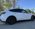 Білий Тесла Model Y, об'ємом двигуна 0 л та пробігом 73 тис. км за 29400 $, фото 2 на Automoto.ua