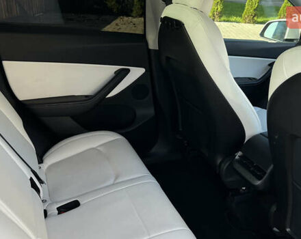 Белый Тесла Model Y, объемом двигателя 0 л и пробегом 88 тыс. км за 25700 $, фото 26 на Automoto.ua