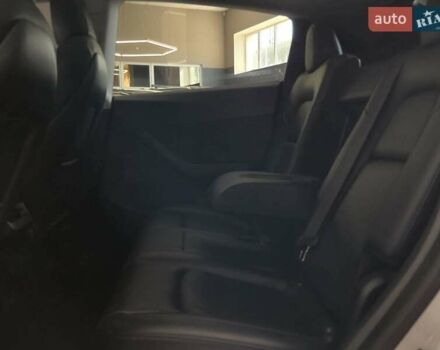 Білий Тесла Model Y, об'ємом двигуна 0 л та пробігом 58 тис. км за 26989 $, фото 10 на Automoto.ua