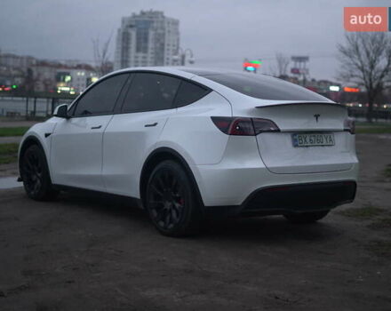 Білий Тесла Model Y, об'ємом двигуна 0 л та пробігом 66 тис. км за 23500 $, фото 58 на Automoto.ua