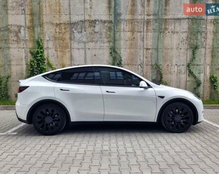 Белый Тесла Model Y, объемом двигателя 0 л и пробегом 98 тыс. км за 23699 $, фото 7 на Automoto.ua