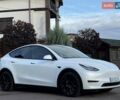 Білий Тесла Model Y, об'ємом двигуна 0 л та пробігом 79 тис. км за 24700 $, фото 24 на Automoto.ua