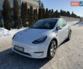 Білий Тесла Model Y, об'ємом двигуна 0 л та пробігом 128 тис. км за 22300 $, фото 1 на Automoto.ua