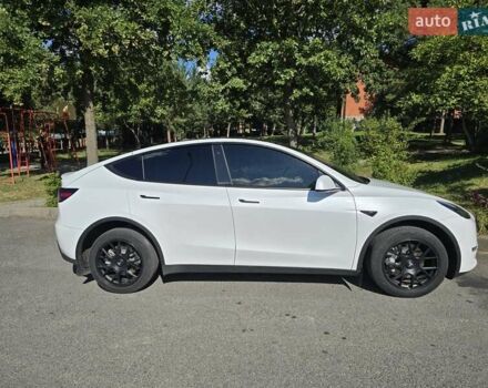 Білий Тесла Model Y, об'ємом двигуна 0 л та пробігом 109 тис. км за 22000 $, фото 67 на Automoto.ua