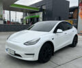 Белый Тесла Model Y, объемом двигателя 0 л и пробегом 76 тыс. км за 26000 $, фото 1 на Automoto.ua