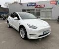 Белый Тесла Model Y, объемом двигателя 0 л и пробегом 68 тыс. км за 24900 $, фото 1 на Automoto.ua