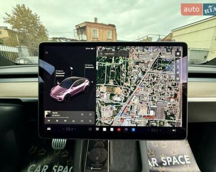 Белый Тесла Model Y, объемом двигателя 0 л и пробегом 88 тыс. км за 26999 $, фото 24 на Automoto.ua