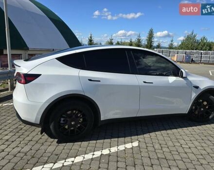 Білий Тесла Model Y, об'ємом двигуна 0 л та пробігом 109 тис. км за 22000 $, фото 61 на Automoto.ua