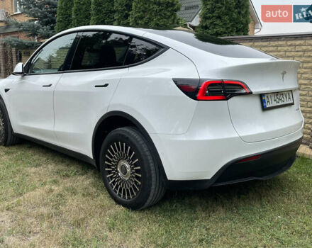 Білий Тесла Model Y, об'ємом двигуна 0 л та пробігом 54 тис. км за 23900 $, фото 17 на Automoto.ua