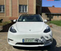 Білий Тесла Model Y, об'ємом двигуна 0 л та пробігом 70 тис. км за 24100 $, фото 1 на Automoto.ua