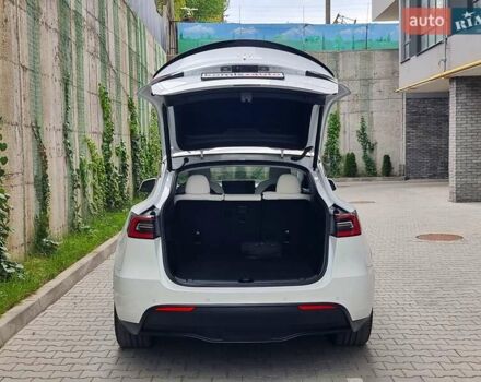 Белый Тесла Model Y, объемом двигателя 0 л и пробегом 98 тыс. км за 26499 $, фото 69 на Automoto.ua