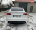 Белый Тесла Model Y, объемом двигателя 0 л и пробегом 50 тыс. км за 28999 $, фото 12 на Automoto.ua