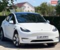 Белый Тесла Model Y, объемом двигателя 0 л и пробегом 51 тыс. км за 23999 $, фото 1 на Automoto.ua