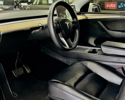 Білий Тесла Model Y, об'ємом двигуна 0 л та пробігом 74 тис. км за 24979 $, фото 9 на Automoto.ua