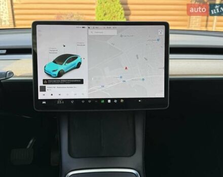 Білий Тесла Model Y, об'ємом двигуна 0 л та пробігом 79 тис. км за 24700 $, фото 76 на Automoto.ua