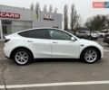 Белый Тесла Model Y, объемом двигателя 0 л и пробегом 68 тыс. км за 24900 $, фото 1 на Automoto.ua