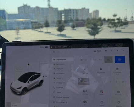 Белый Тесла Model Y, объемом двигателя 0 л и пробегом 65 тыс. км за 27500 $, фото 50 на Automoto.ua