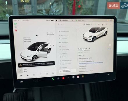 Білий Тесла Model Y, об'ємом двигуна 0 л та пробігом 88 тис. км за 25500 $, фото 80 на Automoto.ua