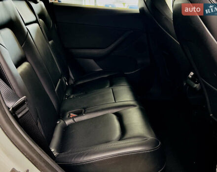 Білий Тесла Model Y, об'ємом двигуна 0 л та пробігом 74 тис. км за 24979 $, фото 12 на Automoto.ua