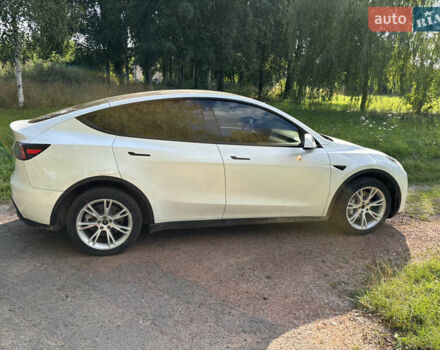 Белый Тесла Model Y, объемом двигателя 0 л и пробегом 101 тыс. км за 17500 $, фото 1 на Automoto.ua