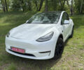 Белый Тесла Model Y, объемом двигателя 0 л и пробегом 75 тыс. км за 26000 $, фото 1 на Automoto.ua