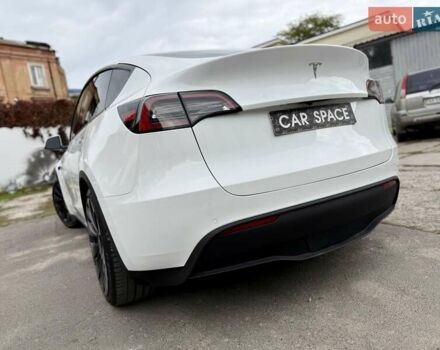 Белый Тесла Model Y, объемом двигателя 0 л и пробегом 88 тыс. км за 26999 $, фото 13 на Automoto.ua