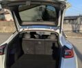 Білий Тесла Model Y, об'ємом двигуна 0 л та пробігом 101 тис. км за 23899 $, фото 24 на Automoto.ua