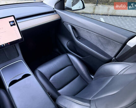 Тесла Model Y 2021 в Хмельницком на Automoto.ua Белый Тесла Model Y, объемом двигателя 0 л и пробегом 83 тыс. км за 25499 $, фото 70 на Automoto.ua