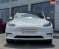 Белый Тесла Model Y, объемом двигателя 0 л и пробегом 34 тыс. км за 31999 $, фото 1 на Automoto.ua