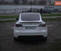Білий Тесла Model Y, об'ємом двигуна 0 л та пробігом 66 тис. км за 23500 $, фото 64 на Automoto.ua