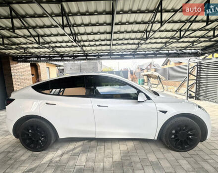 Білий Тесла Model Y, об'ємом двигуна 0 л та пробігом 72 тис. км за 29900 $, фото 2 на Automoto.ua