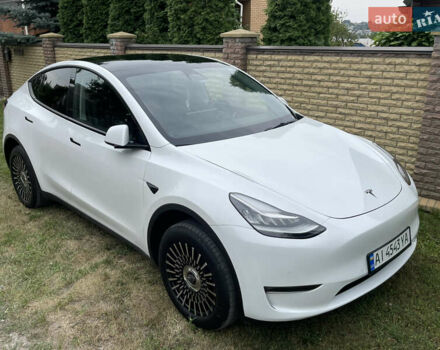 Білий Тесла Model Y, об'ємом двигуна 0 л та пробігом 54 тис. км за 23900 $, фото 1 на Automoto.ua