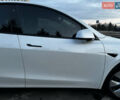 Белый Тесла Model Y, объемом двигателя 0 л и пробегом 55 тыс. км за 25450 $, фото 41 на Automoto.ua