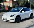 Белый Тесла Model Y, объемом двигателя 0 л и пробегом 98 тыс. км за 21200 $, фото 1 на Automoto.ua